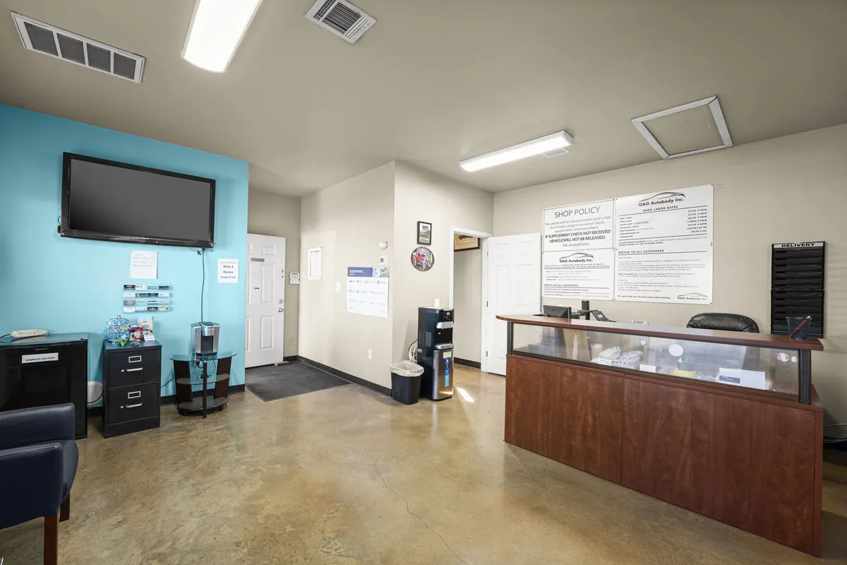 Structural repair work on collision damaged vehicle